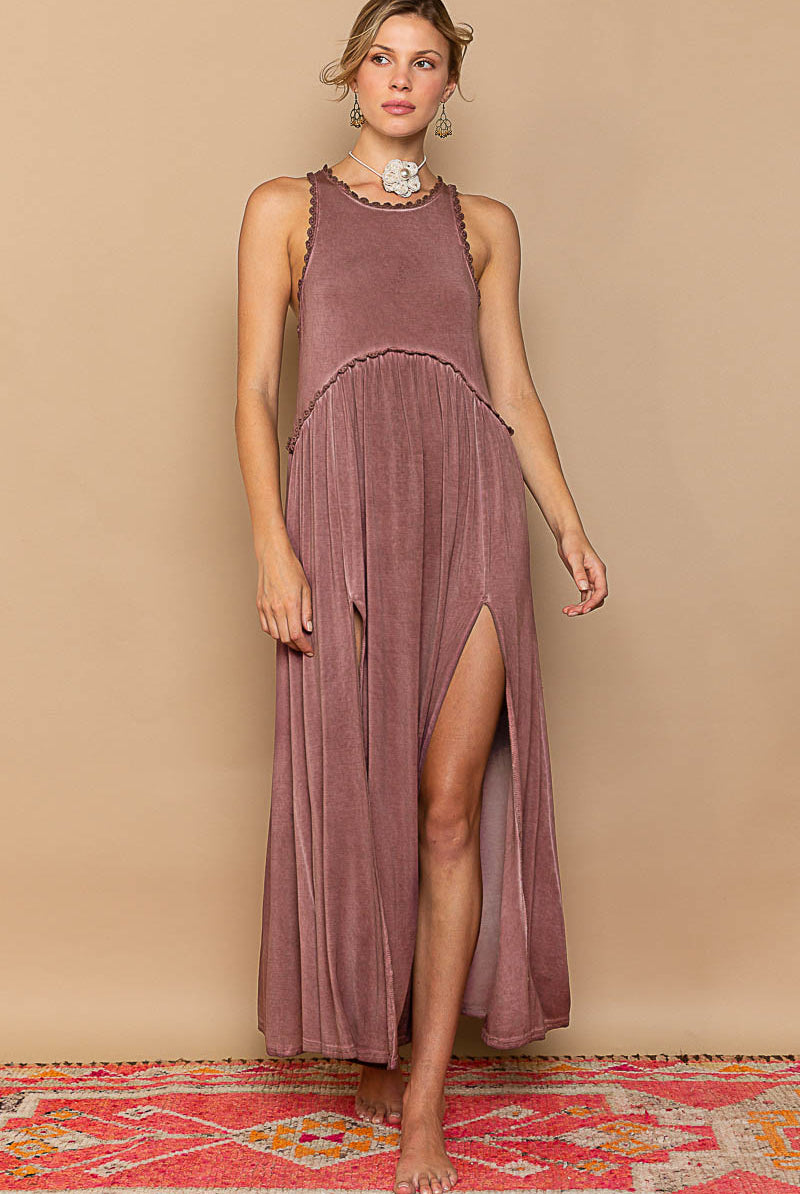RARA Boutique baby doll maxi dress with side slit and cut-out details, featuring a flowing silhouette and stylish design.
