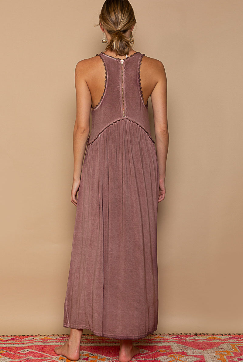 RARA Boutique baby doll side slit cut-out maxi dress in soft fabric, showcasing the flowing design and stylish silhouette.