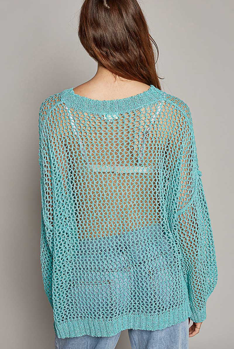 RARA Boutique oversized crochet star sweater featuring a cozy knit pattern and relaxed fit, perfect for casual wear.