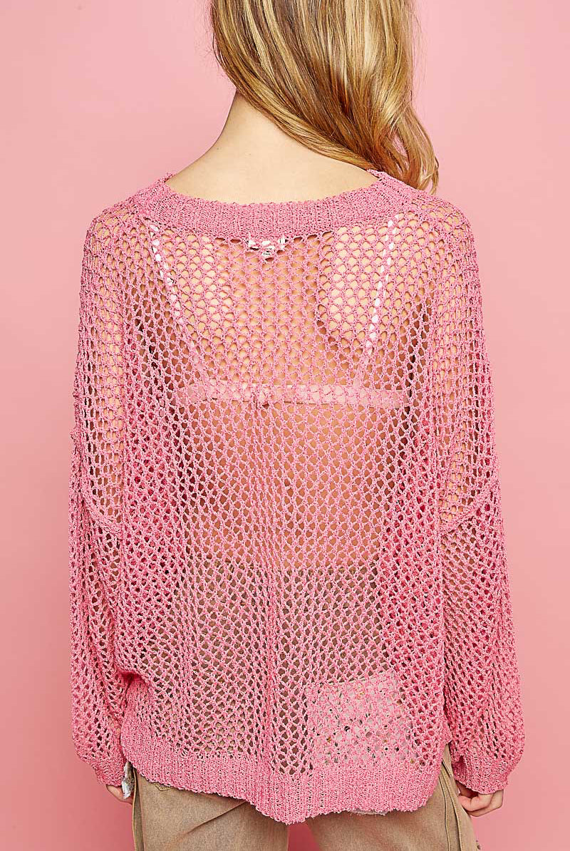 Oversized RARA Boutique crochet star sweater with colorful star patterns, soft knit fabric, and relaxed fit for casual wear.