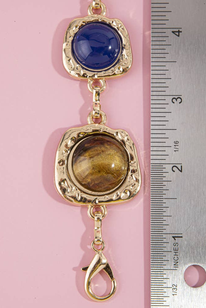 Gemstone cabochon station chain belt with colorful stones and metal links, from Collections by Fame Accessories.