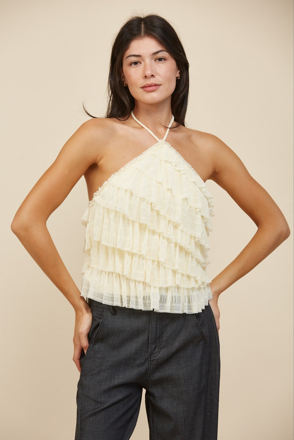 Tiered ruffle halter neck tank top by RARA Boutique, featuring layered fabric and halter straps, displayed on a neutral background.