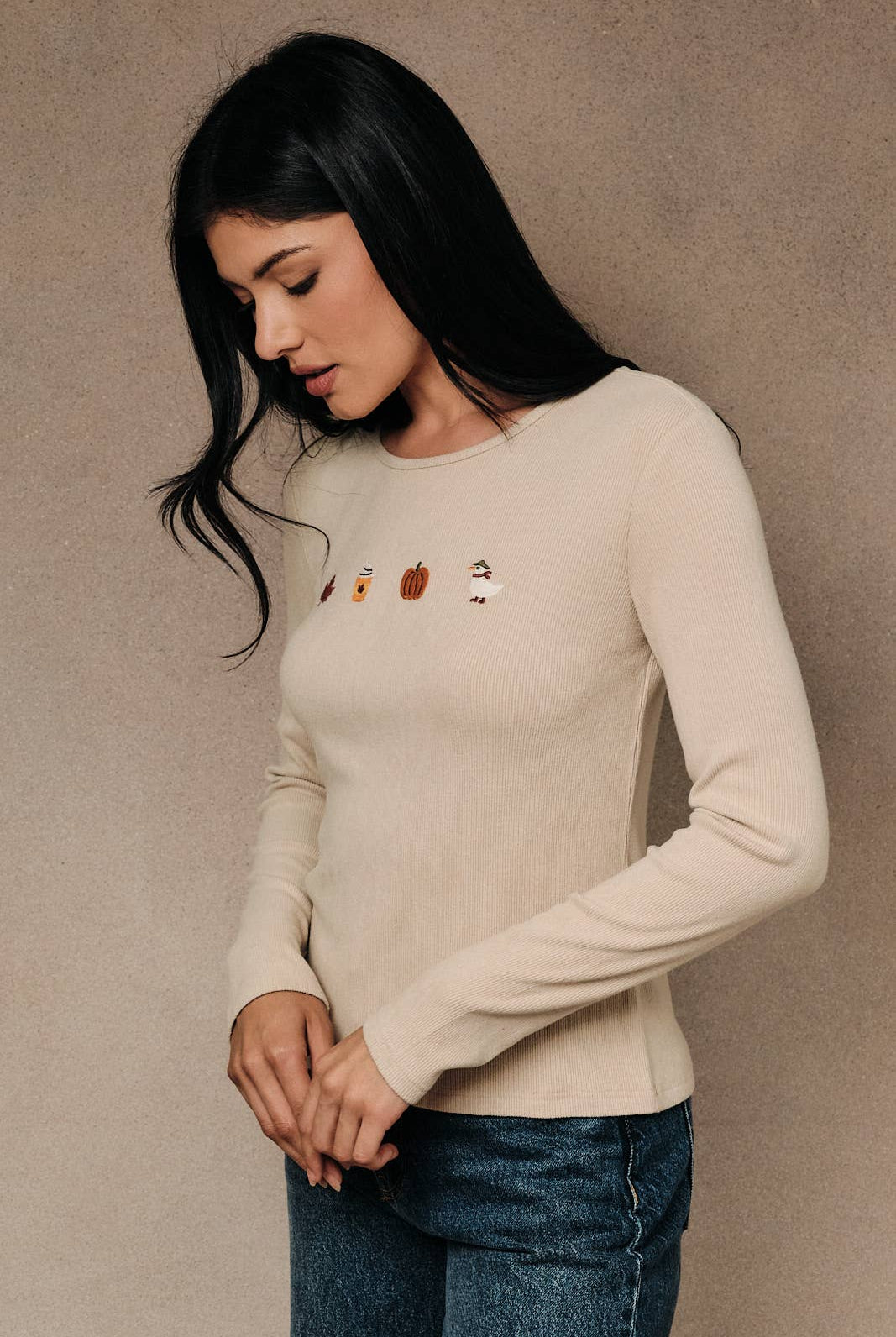Round neck long sleeve ribbed top with fall-themed embroidery by Sunday Edition, featuring autumn-inspired designs.