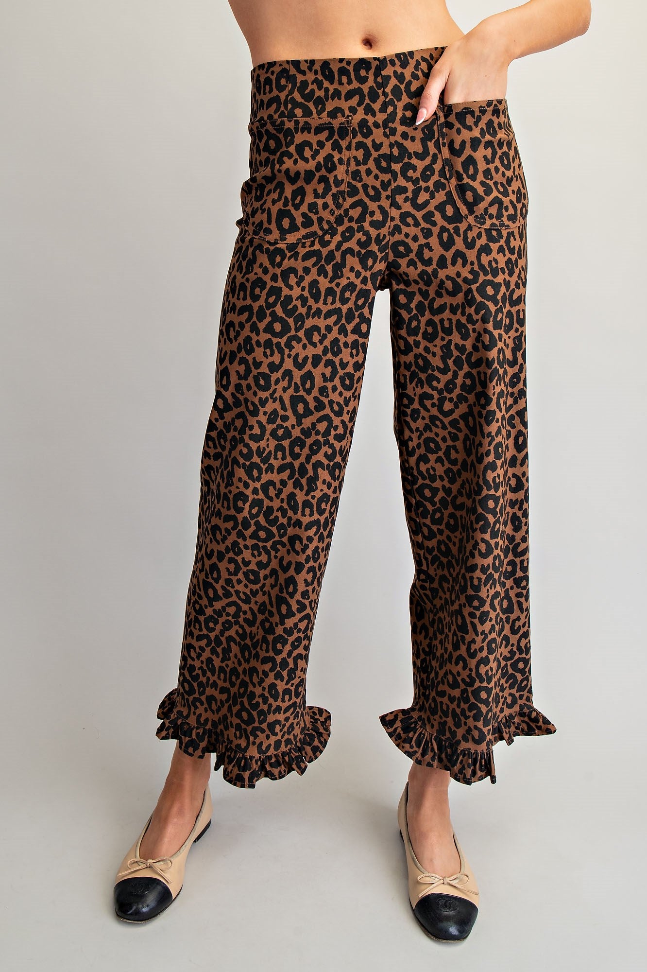 RARA Boutique DELETE Leopard Ruffle Hem Cropped Pants featuring a stylish leopard print and ruffle hem detail.