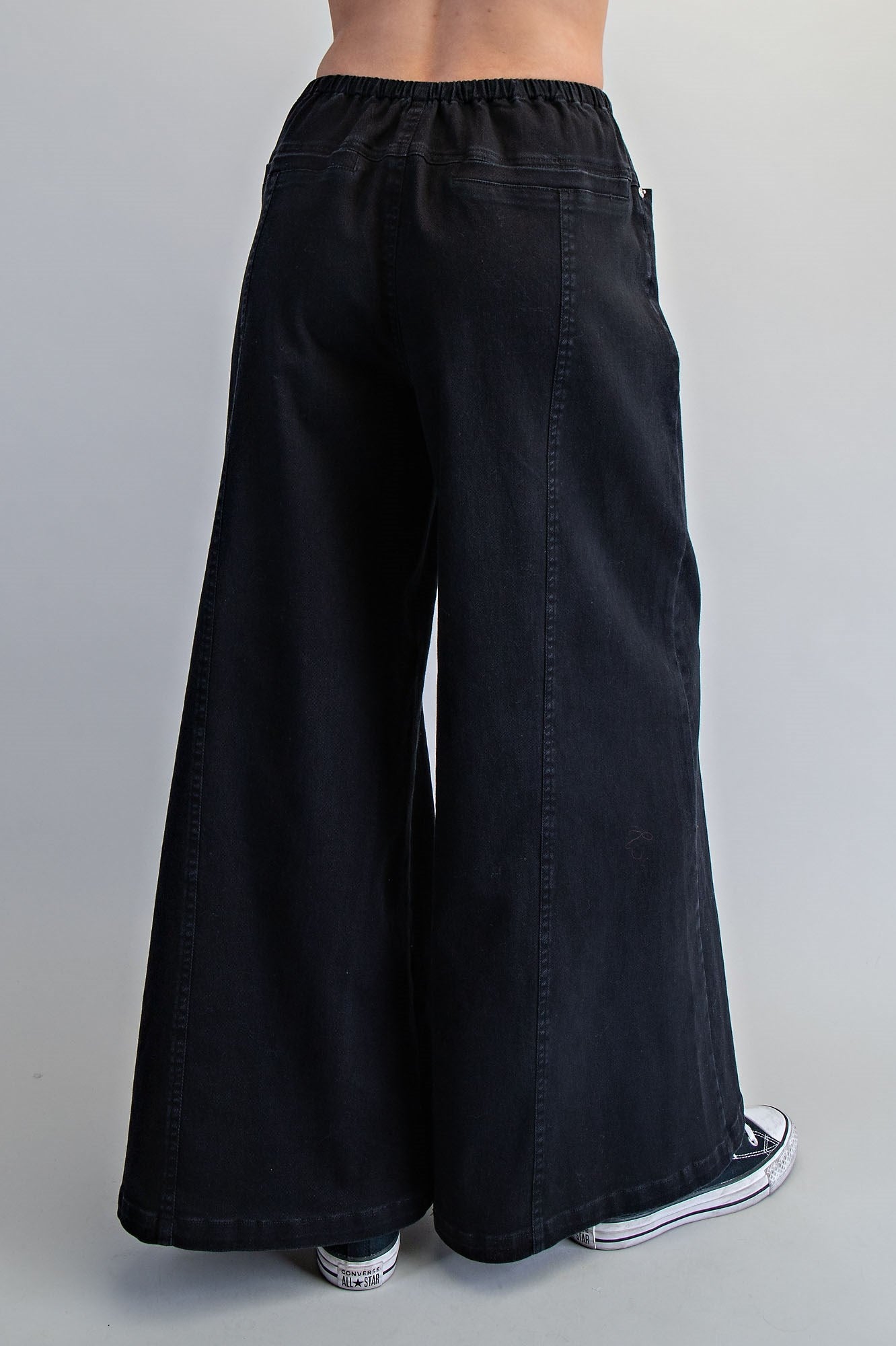 Wide leg slouchy denim pants with drawstring waist from RARA Boutique, featuring a relaxed fit and casual style.