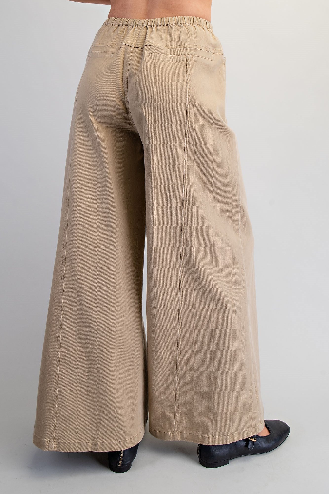 Wide leg slouchy denim pants with drawstring waist from RARA Boutique, featuring relaxed fit and casual style.