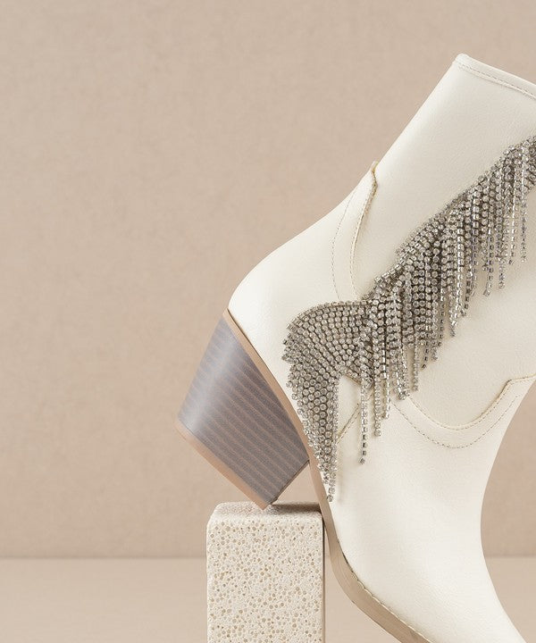 Rhinestone fringe ankle Western boots by RARA Boutique featuring shiny rhinestones and fringe detail on leather cowboy-style boot