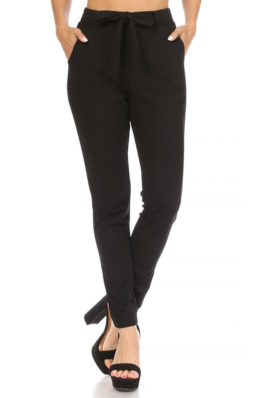 Black knit crepe high waist paperbag trousers from RARA Boutique, featuring a stylish high waist and relaxed fit.