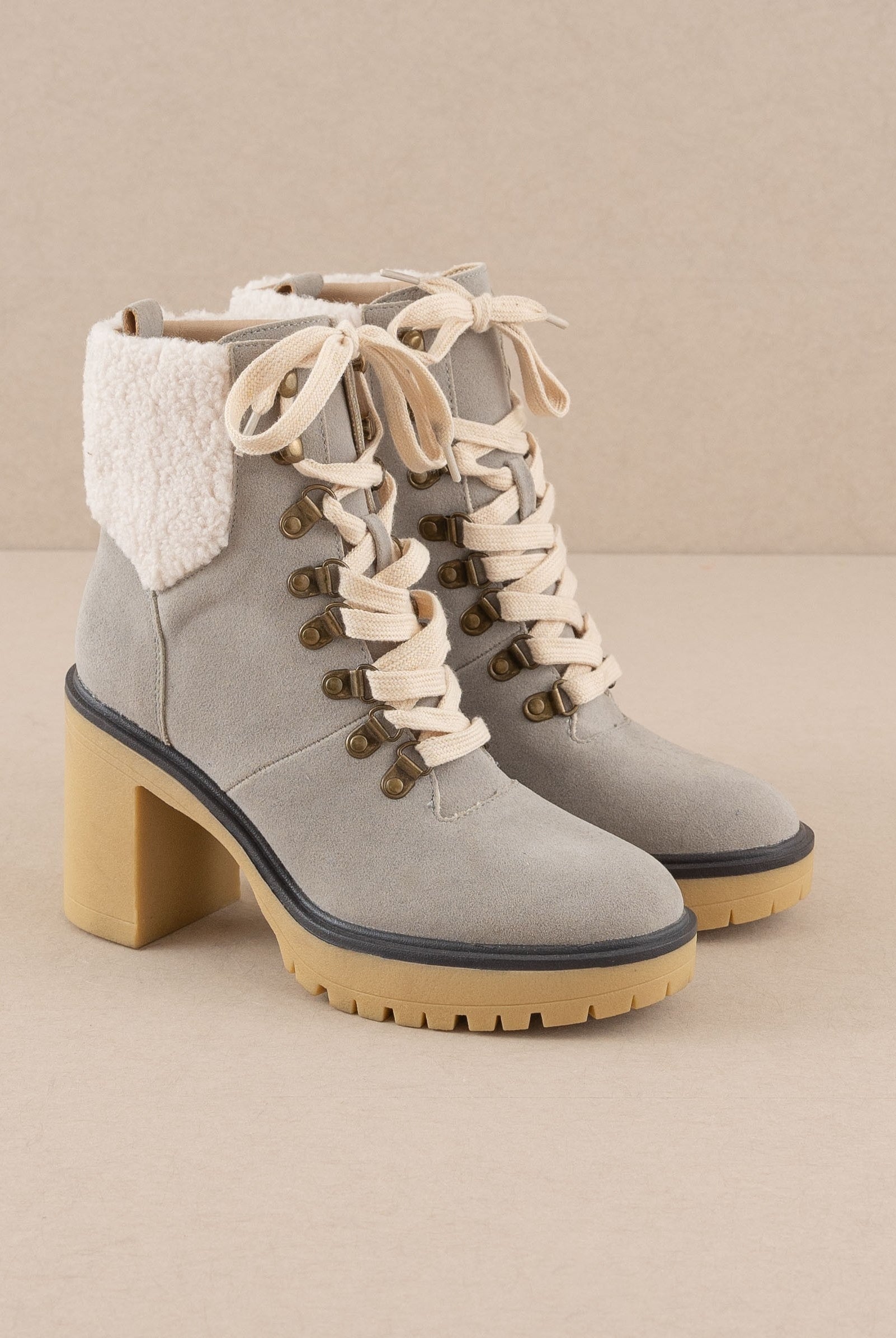 RARA Boutique heeled platform lace-up sherpa boots with chunky soles and cozy fur lining, stylish winter footwear.