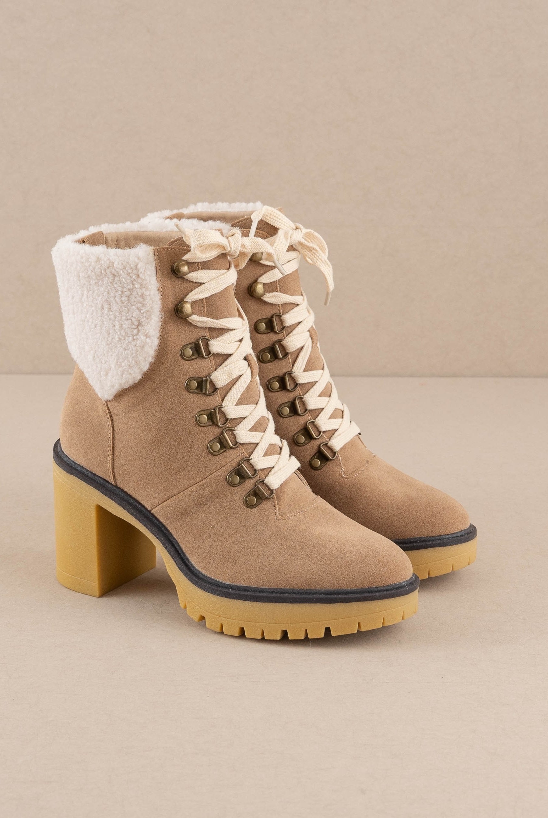 RARA Boutique heeled platform lace-up sherpa boots with chunky sole and cozy fur lining, stylish winter footwear.