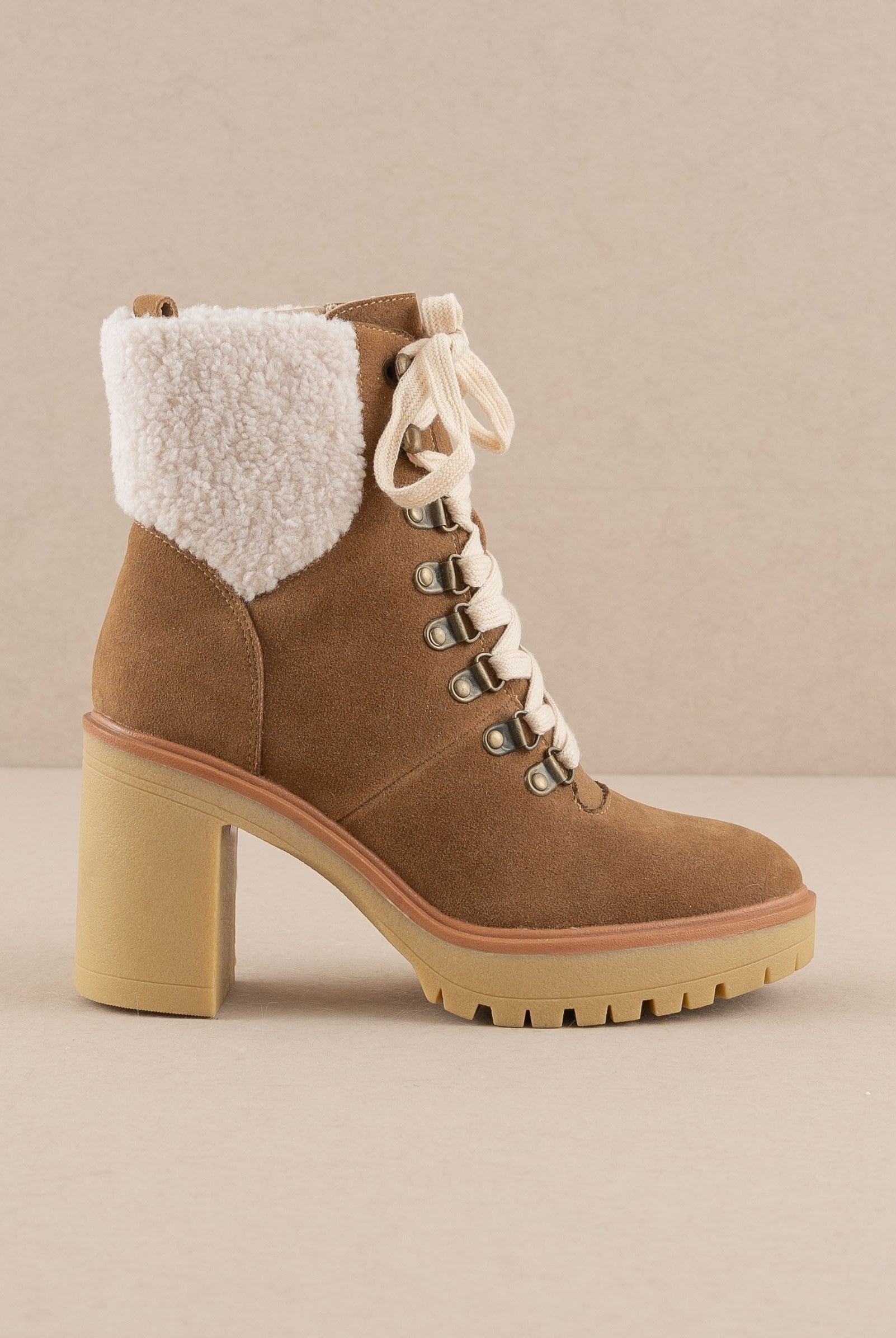 RARA Boutique heeled platform lace-up sherpa boots with chunky soles and cozy fur lining, stylish winter footwear.