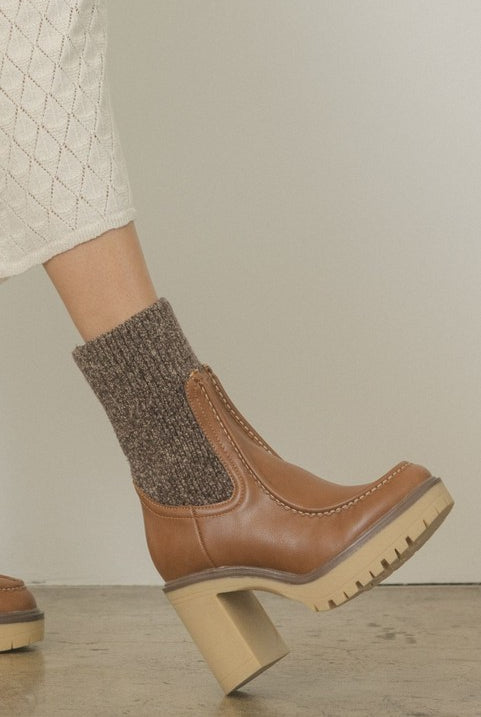RARA Boutique heeled platform sweater sock boots with chunky heel and cozy knit upper, stylish ankle-length footwear.