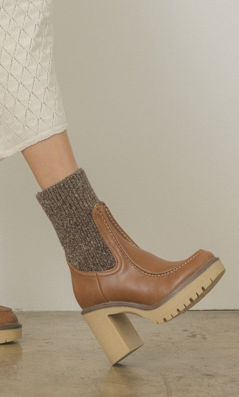 RARA Boutique heeled platform sweater sock boots with chunky heel and cozy knit upper, stylish ankle-length footwear.