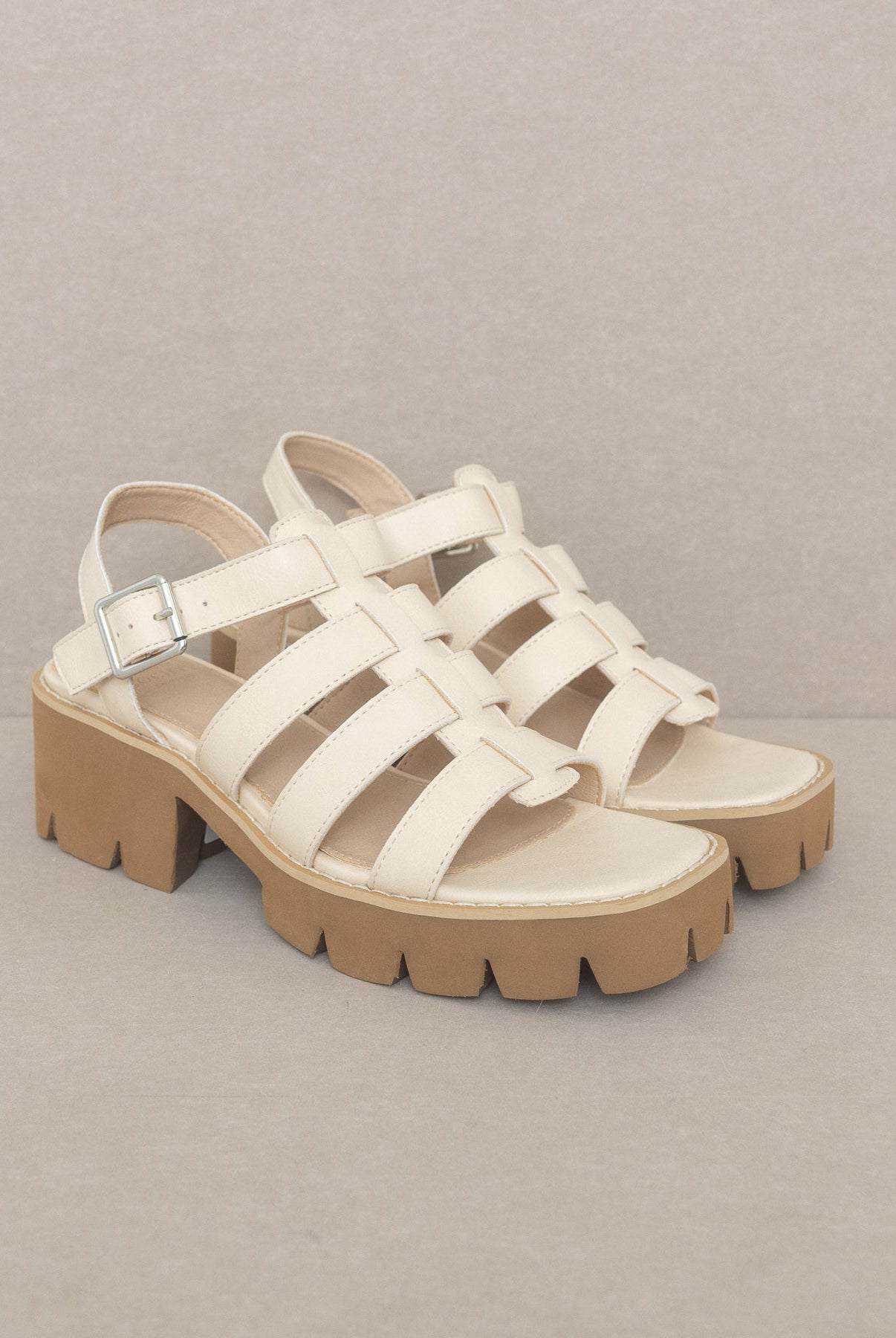 RARA Boutique Lug Sole Heeled Gladiator Sandals with multiple straps and open toe design, stylish summer footwear.