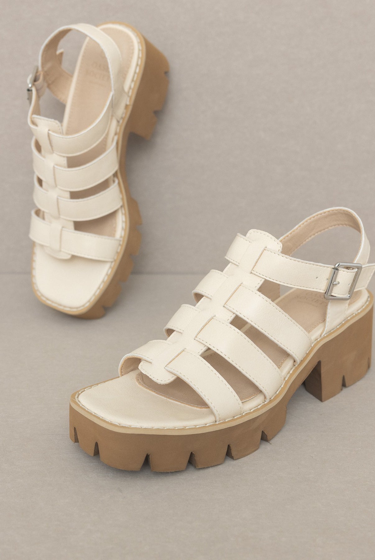 RARA Boutique Lug Sole Heeled Gladiator Sandals with multiple straps and ankle buckle detail, stylish footwear for summer.