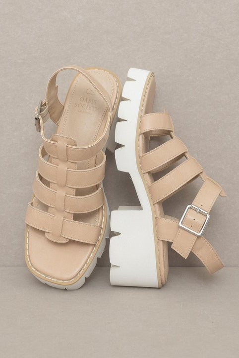 RARA Boutique Lug Sole Heeled Gladiator Sandals featuring multiple straps and chunky heel on a neutral background.