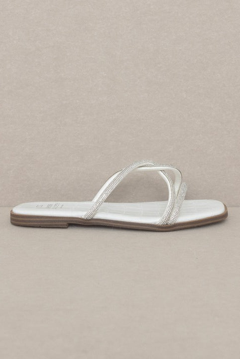 RARA Boutique strappy rhinestone sandals with delicate straps and sparkling embellishments, perfect for stylish summer footwear.
