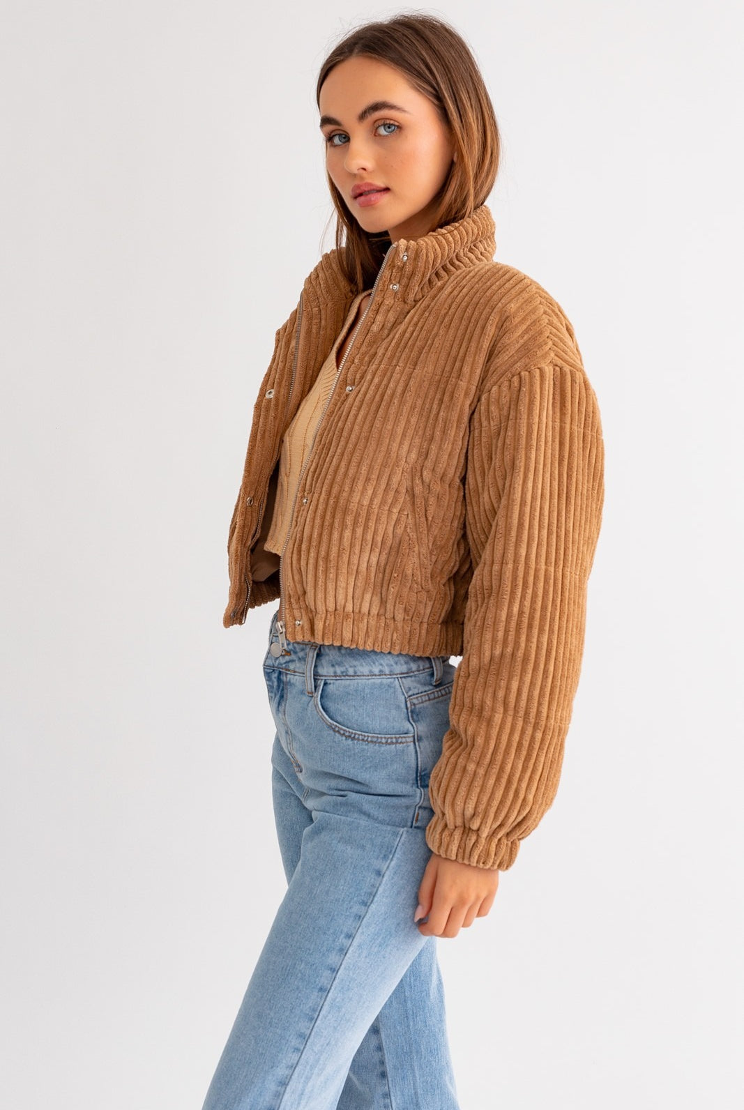 Le Lis cropped corduroy puffer jacket by RARA Boutique, shown in a stylish puffed design with a cropped fit and textured corduroy fabric.