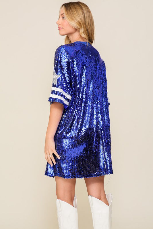 RARA Boutique sequin game day jersey shirt dress with long sleeves and metallic embellishments, perfect for sports events.