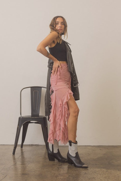 Rhinestone studded western booties with metal toe from RARA Boutique featuring intricate rhinestone detailing and pointed western style.