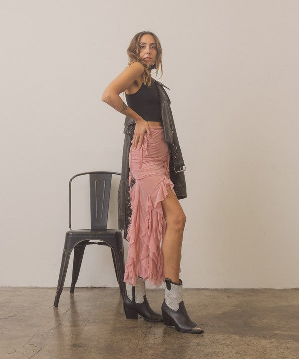 Rhinestone studded western booties with metal toe from RARA Boutique featuring intricate rhinestone detailing and pointed western style.