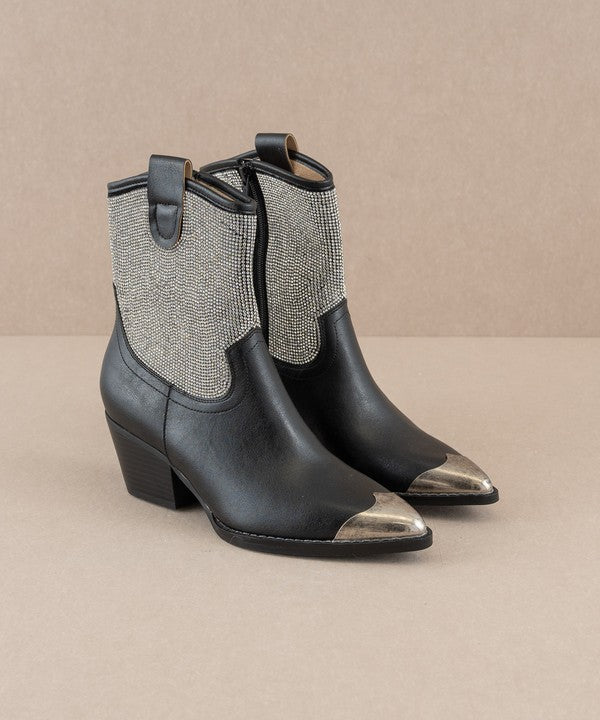 Rhinestone studded western booties with metal toe from RARA Boutique featuring intricate details and a stylish western design.