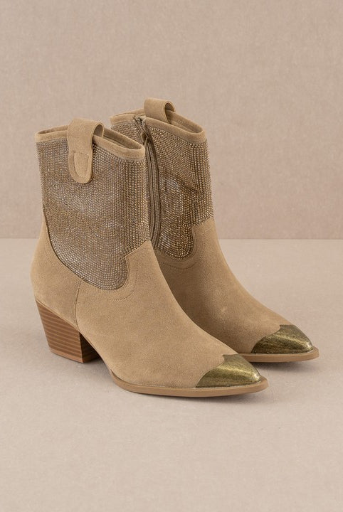 Rhinestone studded western booties with metal toe by RARA Boutique featuring intricate rhinestone details and western style design.