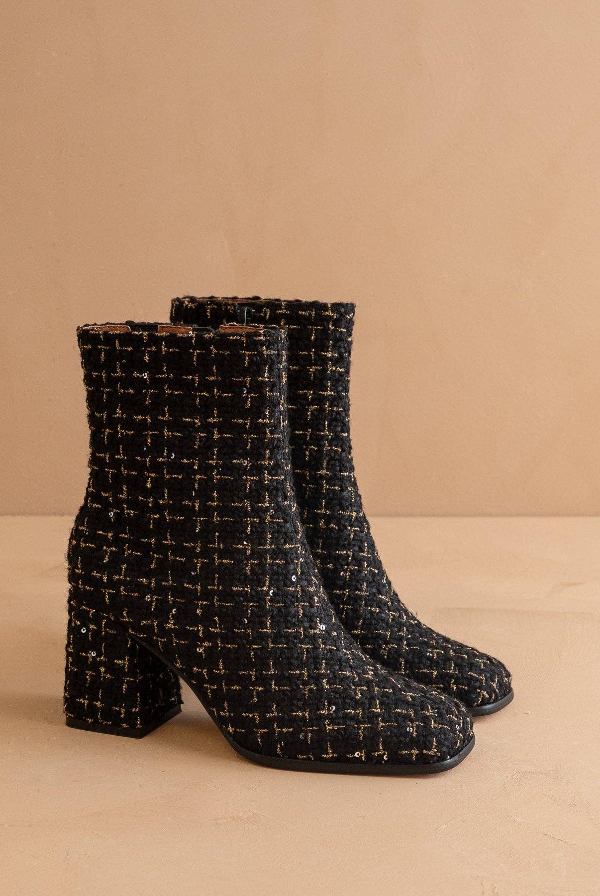 Black tweed woven block heel ankle boot from Oasis Society featuring stylish fall footwear with a sleek ankle design.