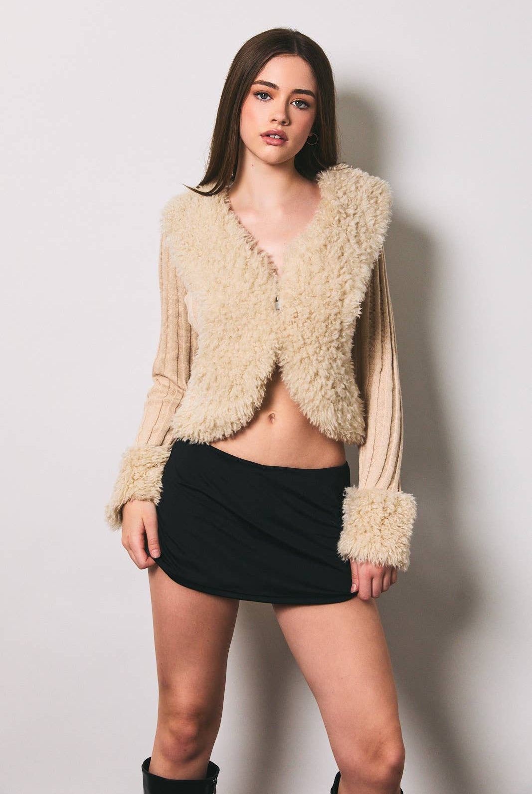 Le Lis long sleeve V-neck fur sweater with ribbed jacket, featuring cozy plush fur and ribbed knit details for warmth and style.