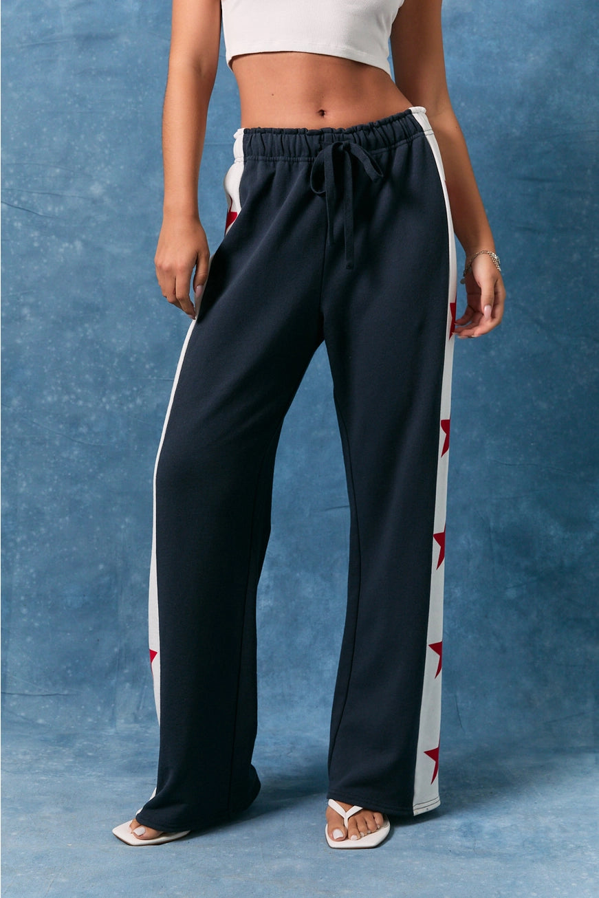 Le Lis Star Side Stripe Wide Leg Baggy Sweatpants with relaxed fit and stylish star side details, made by RARA Boutique.