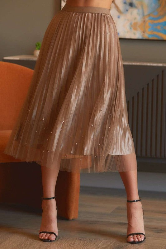 Pearl-embellished pleated mesh midi skirt by RARA Boutique, showcasing intricate detailing and elegant design.