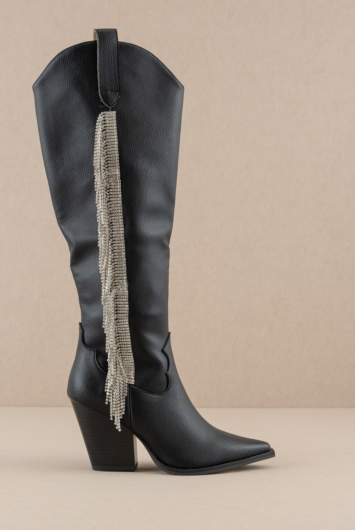 Rhinestone fringe knee-high Western boots by RARA Boutique featuring sparkling rhinestones and western style detailing.