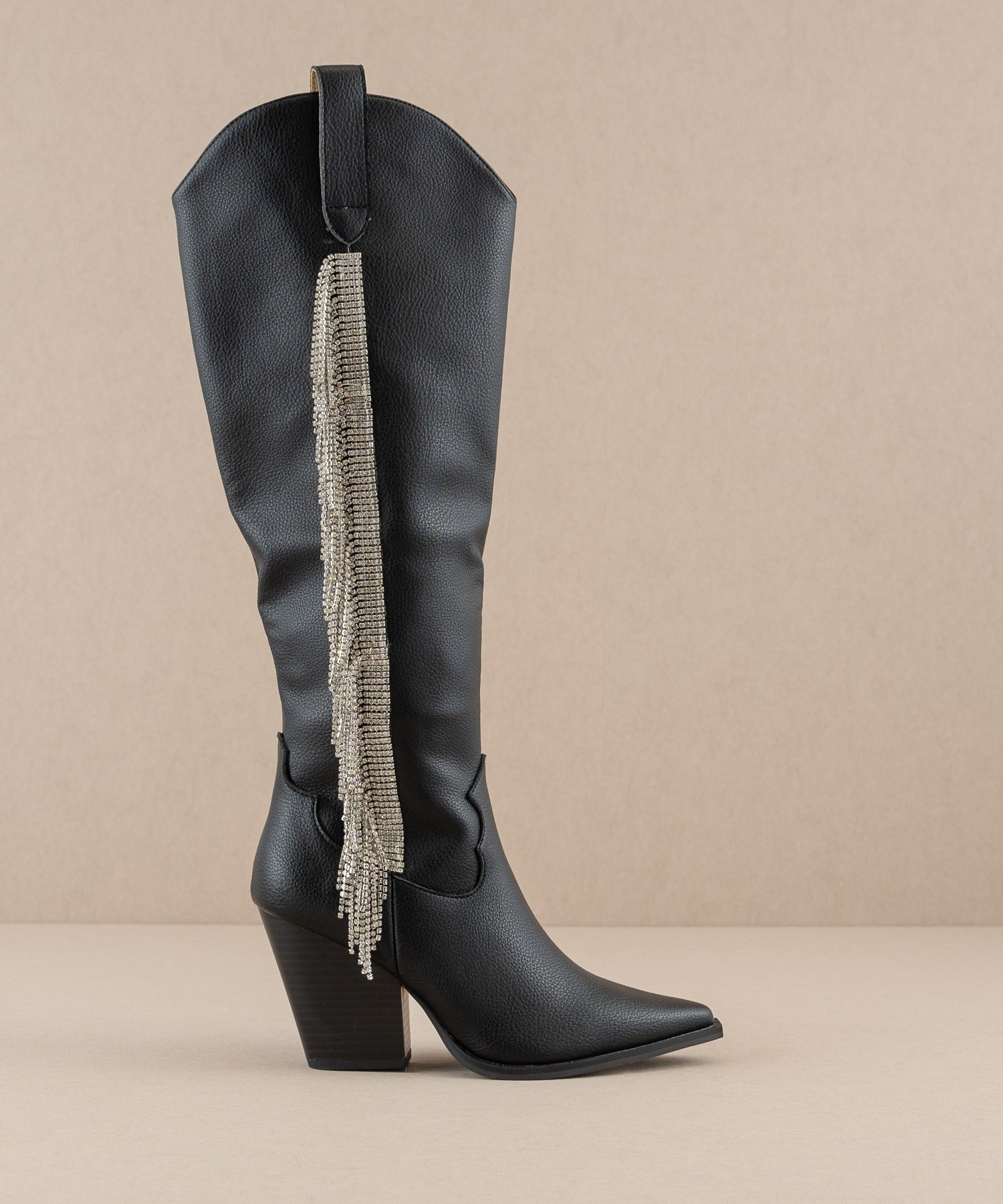 Rhinestone fringe knee-high Western boots by RARA Boutique featuring sparkling rhinestones and western style detailing.