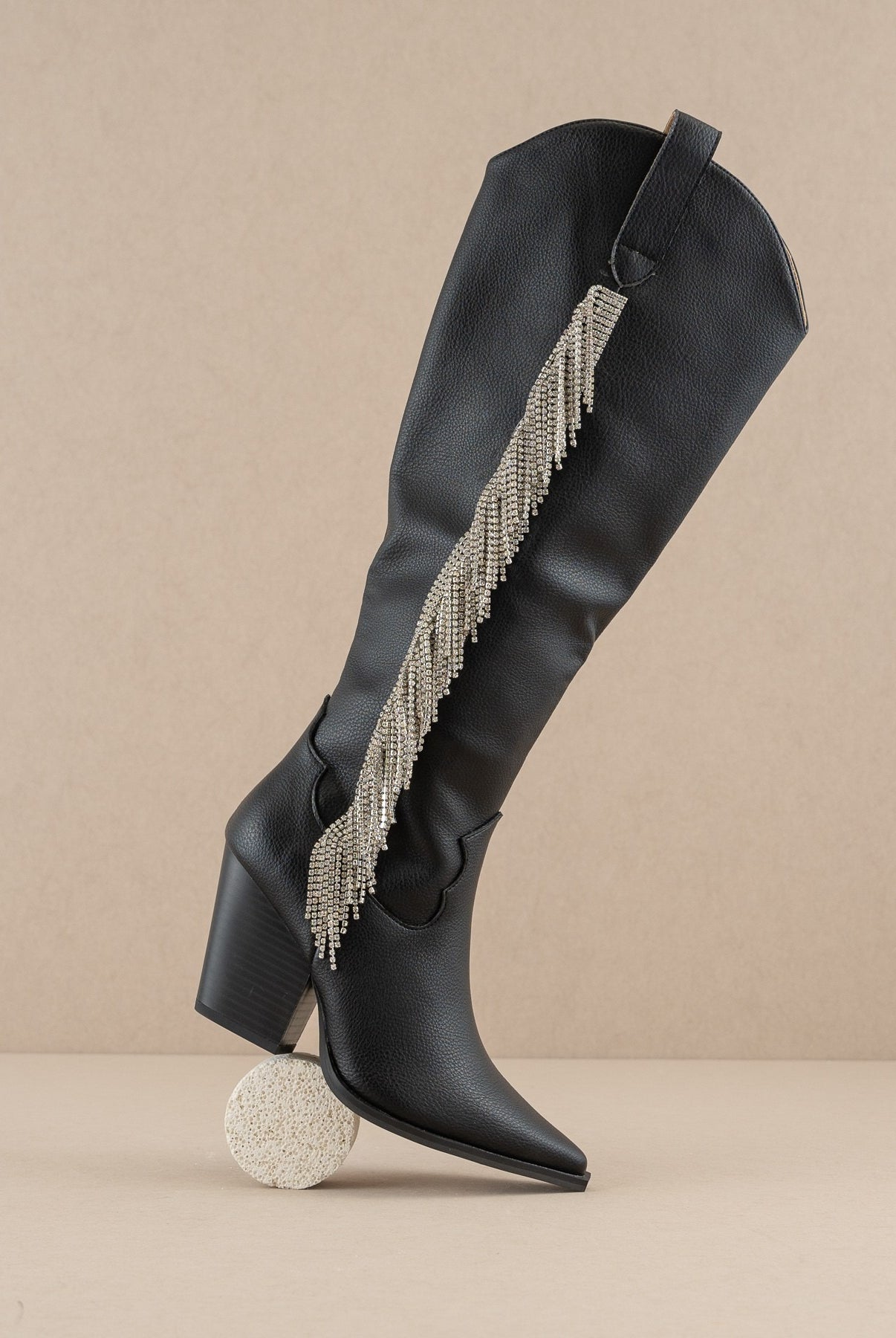 Rhinestone fringe knee-high Western boots by RARA Boutique featuring sparkling rhinestones and Western-style design.