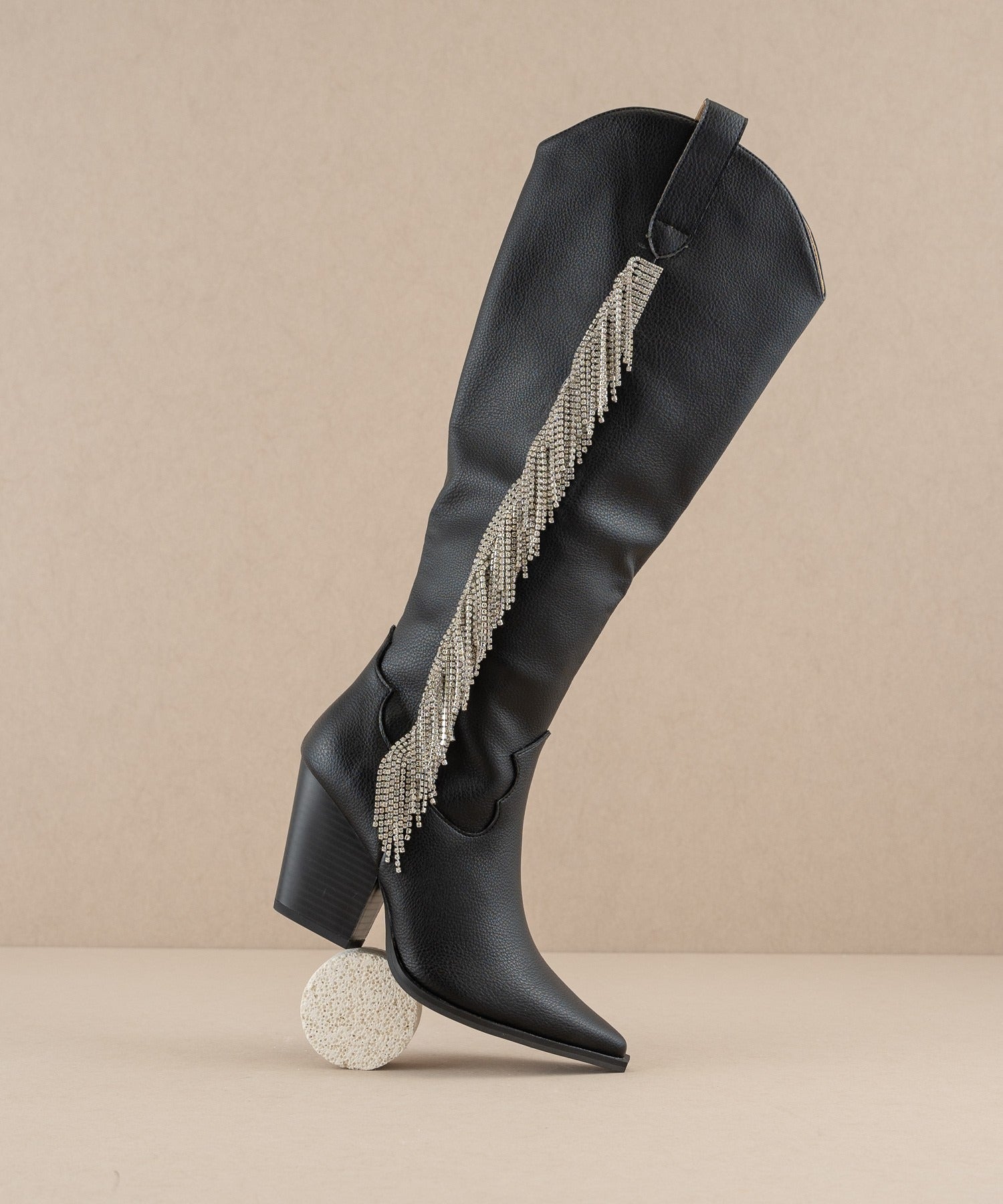Rhinestone fringe knee-high Western boots by RARA Boutique featuring sparkling rhinestones and Western-style design.
