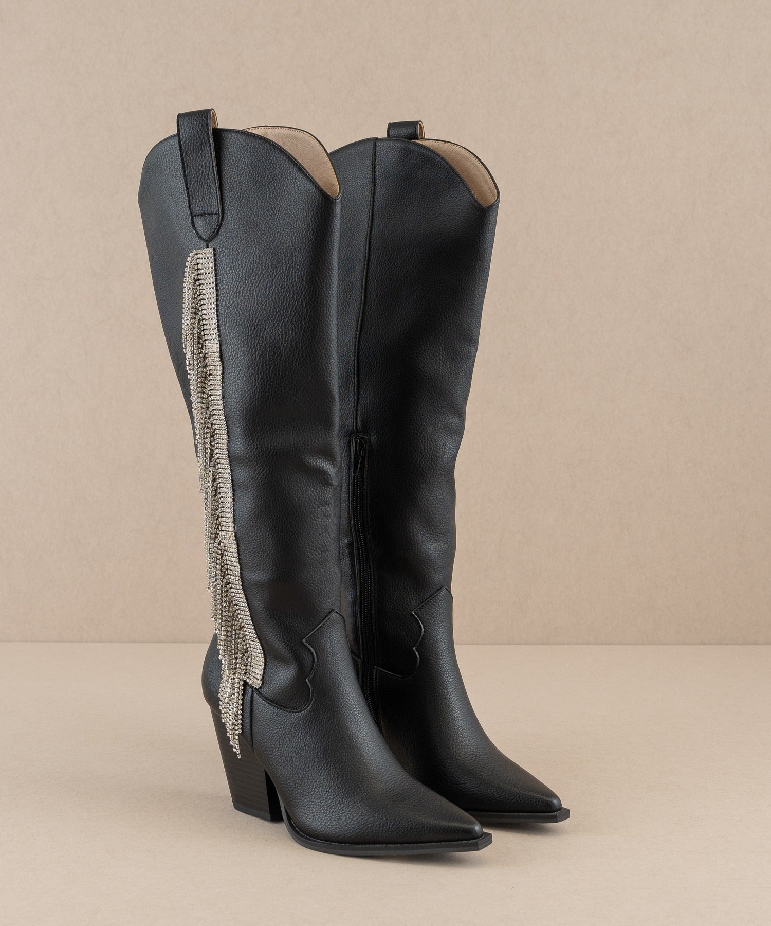 Rhinestone fringe knee-high Western boots by RARA Boutique featuring intricate detailing and a stylish Western design.