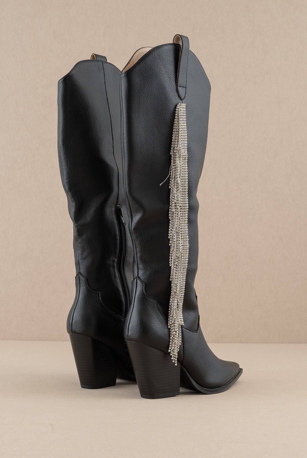 Rara Boutique Rhinestone Fringe Knee High Western Boots with decorative western-style stitching and sparkling rhinestone details.