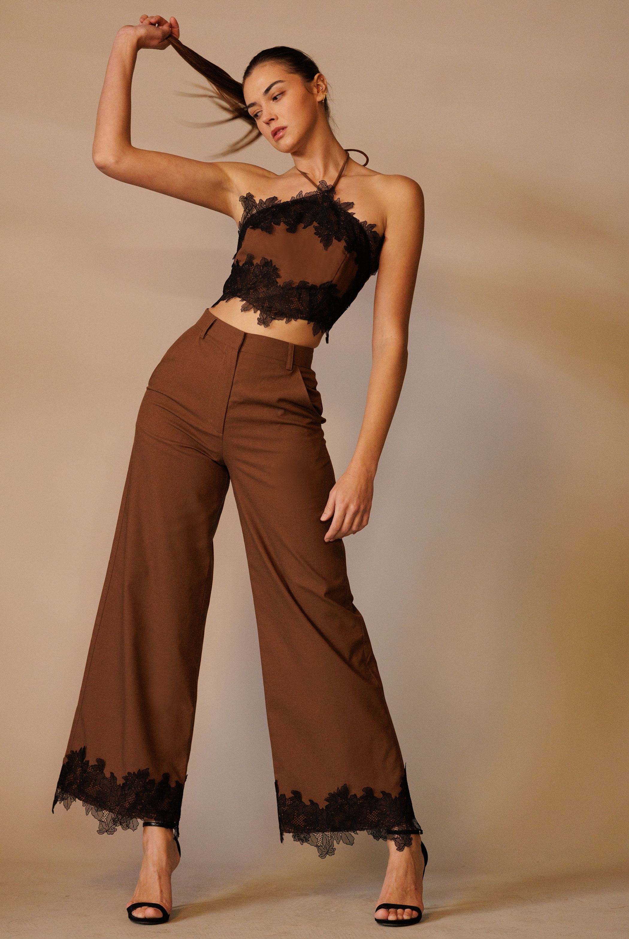RARA Boutique lace trim hem wide-leg trouser pants with relaxed fit and stylish design, shown in a sleek, lightweight fabric.