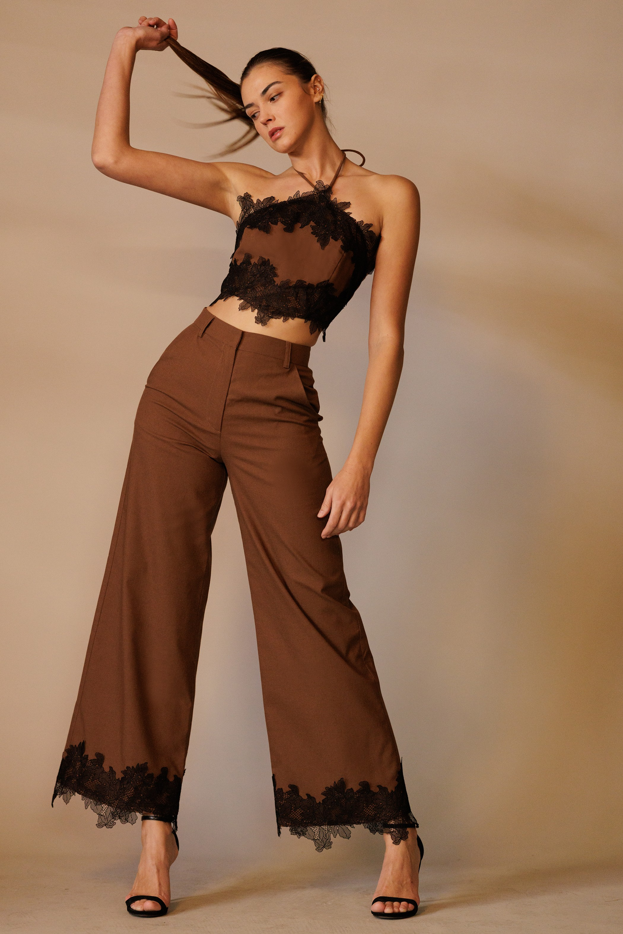 RARA Boutique lace trim hem wide-leg trouser pants with relaxed fit and stylish design, shown in a sleek, lightweight fabric.