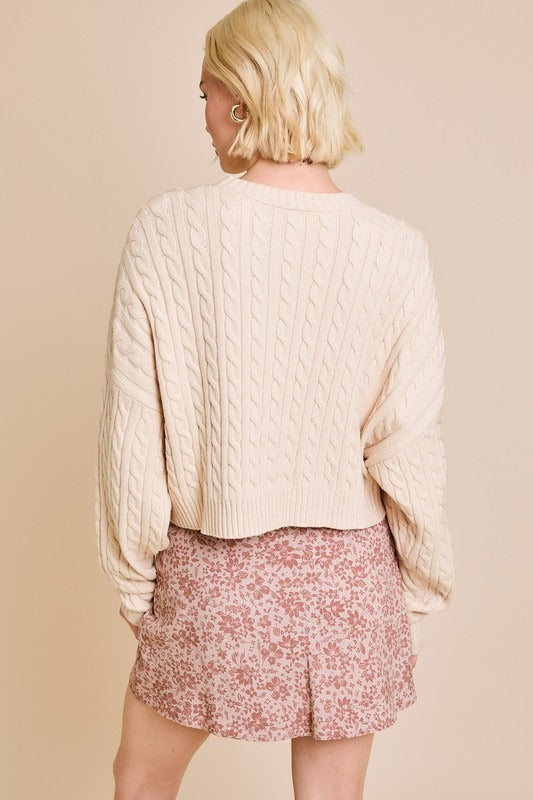 RARA Boutique Dolman sleeve cable knit cropped sweater with front pocket, cozy and stylish women's sweater in soft yarn.