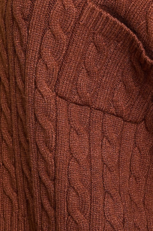 RARA Boutique Dolman sleeve cable knit cropped sweater with pocket, showcasing soft texture and relaxed fit in natural light.