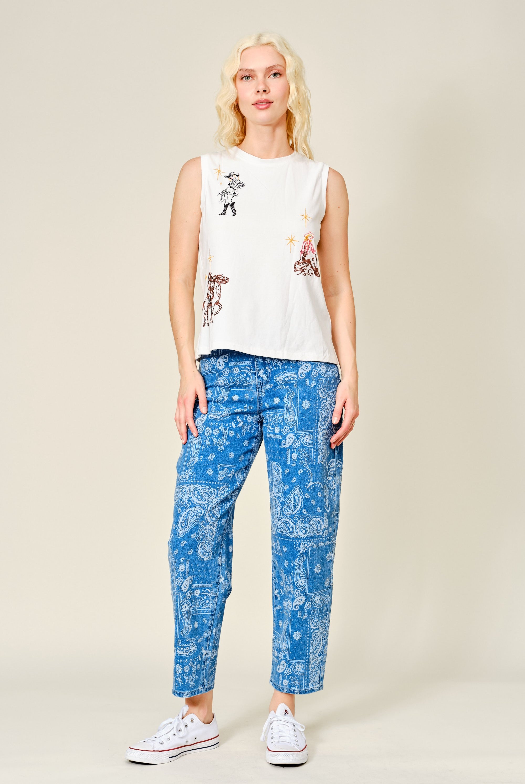 Blue embroidered Western cowgirl tank top from RARA Boutique with intricate stitch detailing and sleeveless design.