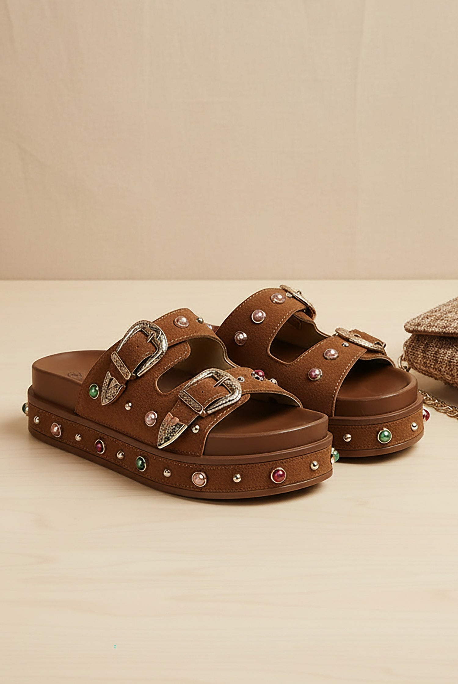 RARA Boutique studded double buckle platform slide sandals showing black leather straps with silver studs and buckles.