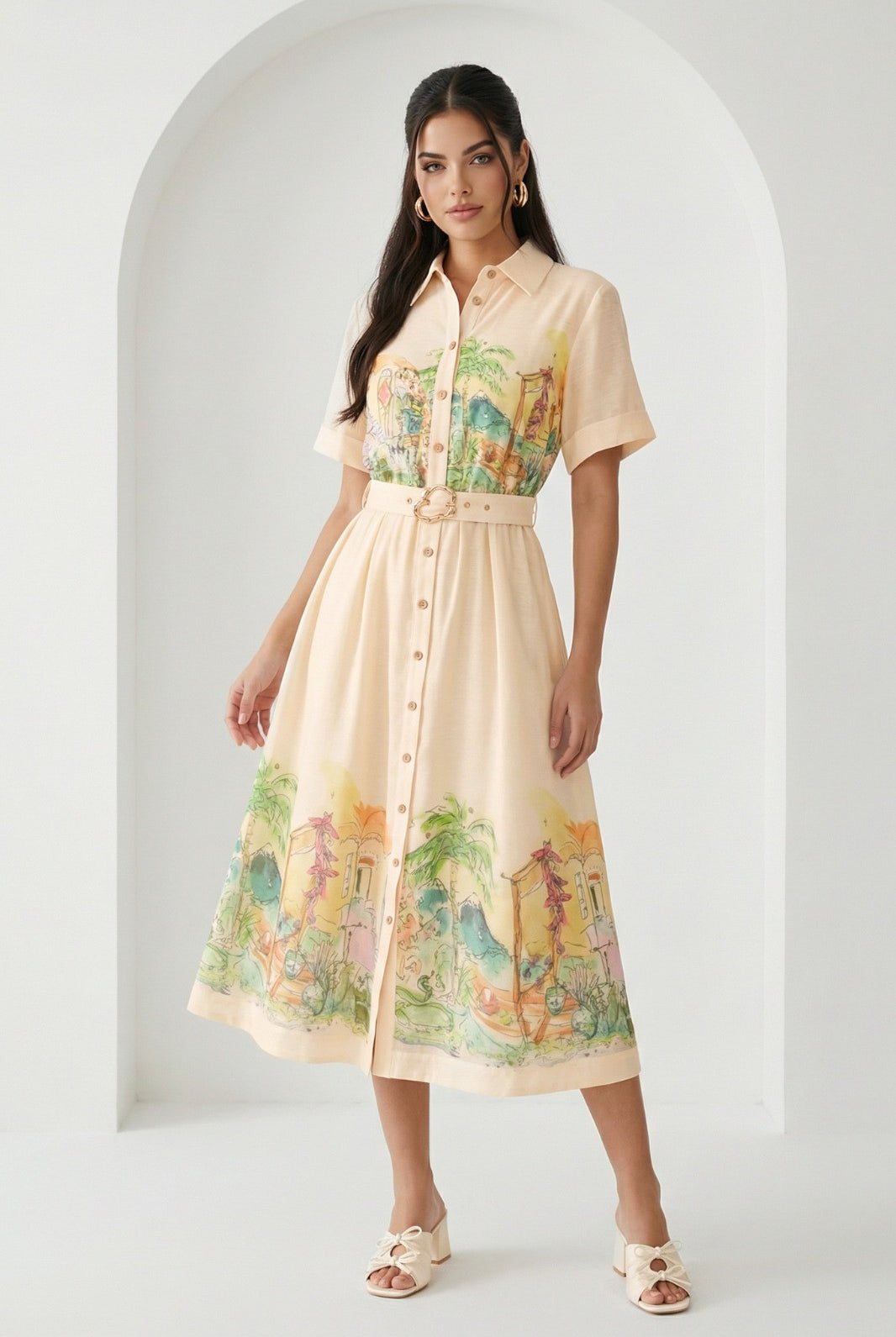 Watercolor village print belted midi dress by RARA Boutique in peach, featuring a flowy silhouette and watercolor landscape design.