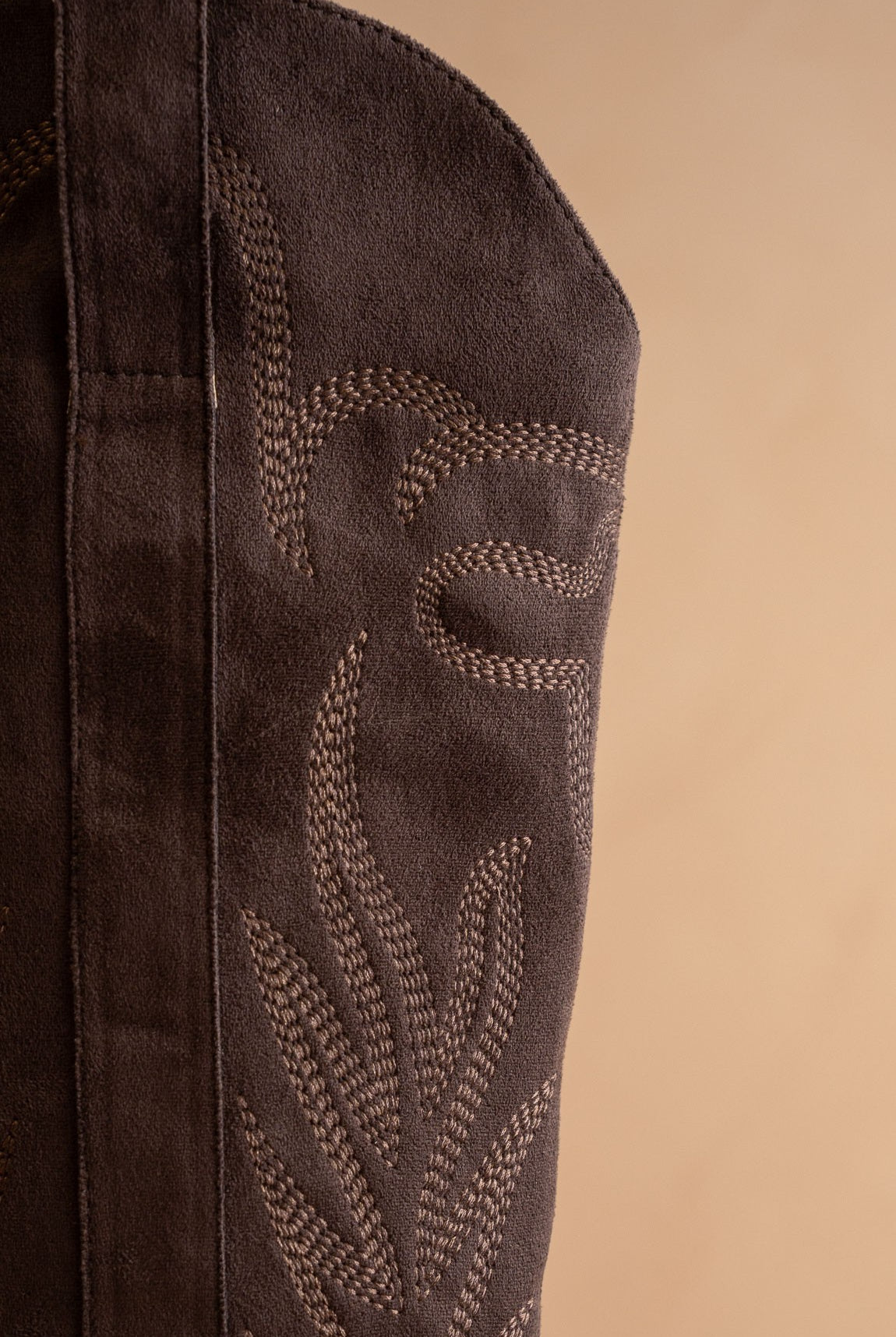 RARA Boutique tall knee-high Western embroidered pointed toe boots with intricate embroidery and sleek leather finish.