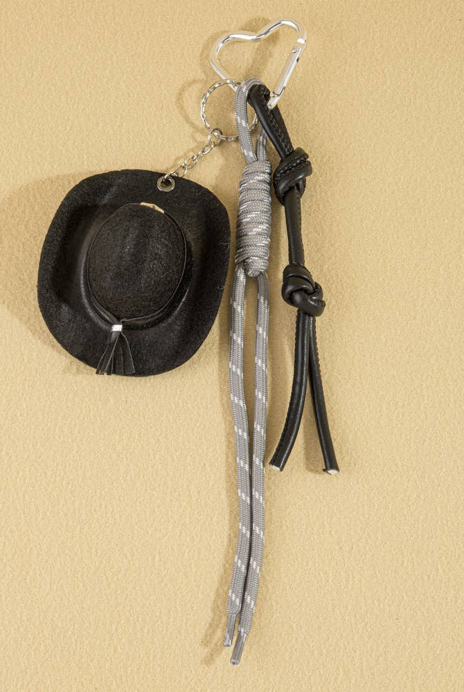 Mini cowboy hat Western rope bag charm from Collections by Fame Accessories attached to a bag with rustic western style.