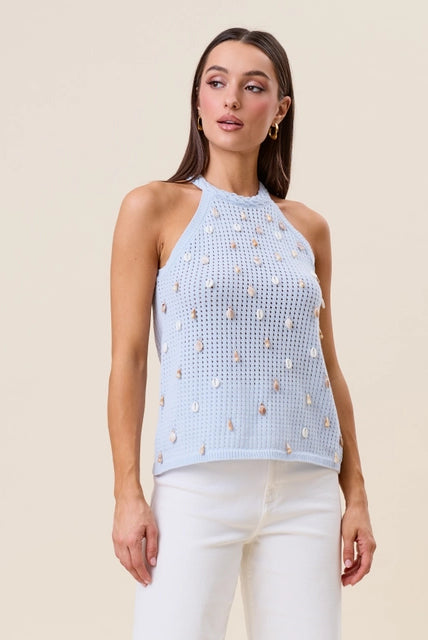 Seashell embellished open knit halter tank top in beige from RARA Boutique, featuring a stylish open-knit design and seashell accents.