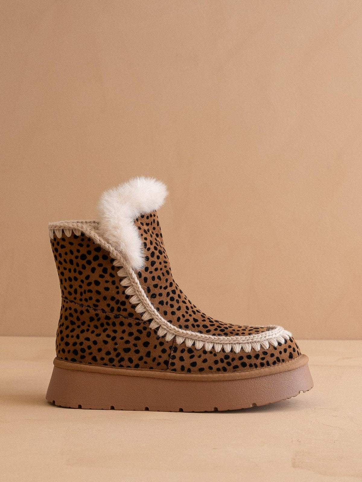 OASIS SOCIETY Joyce dark cheetah shearling trim platform winter boot with rugged sole and cozy shearling lining.