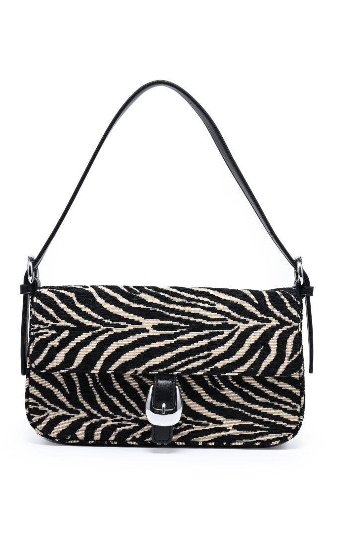 Urban Expressions Tuesday Gloria zebra shoulder bag with black and white striped pattern and adjustable shoulder strap.