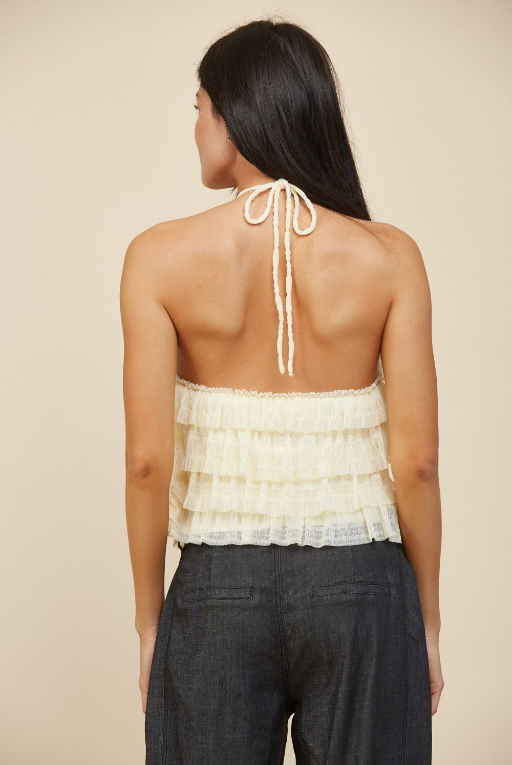 RARA Boutique tiered ruffle halter neck tank top in soft fabric, featuring layered ruffles and a stylish halter design.